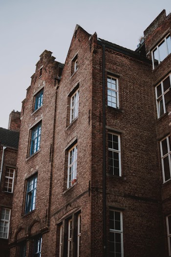 Low Angle Photo of Brown Building
