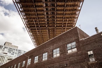 low angle photo of brown concrete building