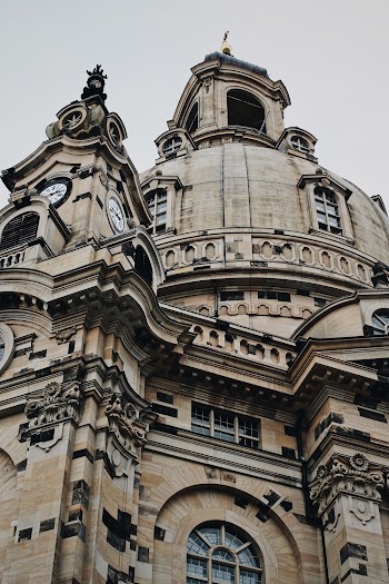 Low-angle Photo of Brown Concrete Church