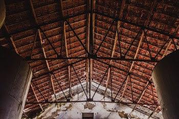 Low angle Photo Of Brown Metal Roof