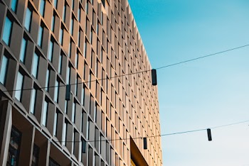 Low-angle Photo of Building Under Blue Sky