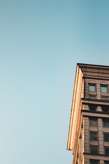 Low Angle Photo of Building Under Clear Sky