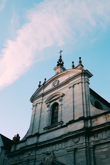 Low Angle Photo of Church Building Under Blue Sky