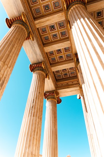 Low Angle Photo of Columns and Pillars