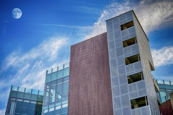 Low Angle Photo of Commercial Building Under Blue Sky