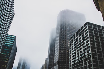 Low Angle Photo of Curtains Wall Building