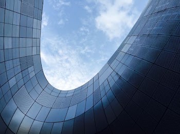 low angle photo of glass building