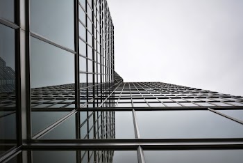 Low Angle Photo of Glass Building
