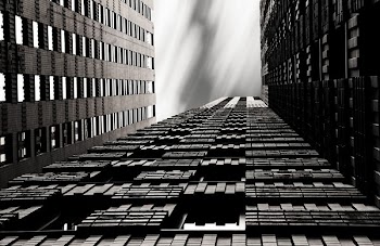 low-angle photo of gray concrete high-rise building