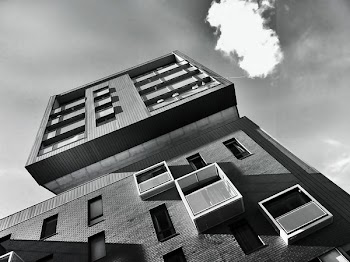 Low-angle Photo of Gray Mid-high Concrete Building