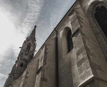 Low-angle Photo of Grey Concrete Building