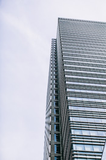Low Angle Photo of High-rise Building Under Clear Sky