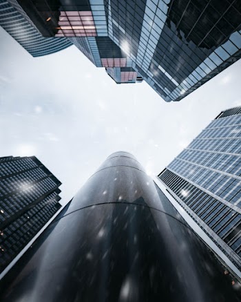 Low Angle Photo Of High Rise Buildings