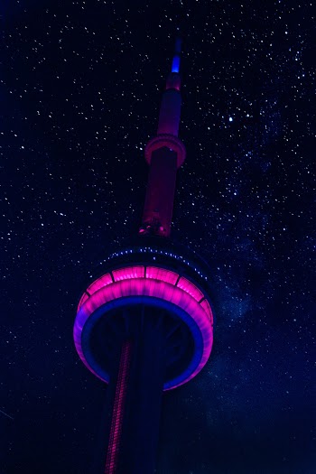 Low-angle Photo of Lighted Tower during Night