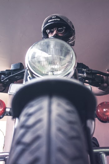 Low Angle Photo Of Man Riding A Bicycle  