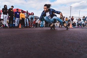Low Angle Photo of Man Skating Outdoors
