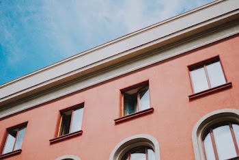 Low-Angle Photo of Pink Concrete Building