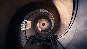 low angle photo of spiral stairs