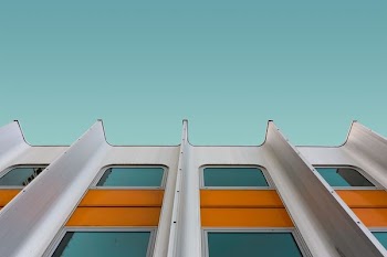 low angle photo of white and orange structure