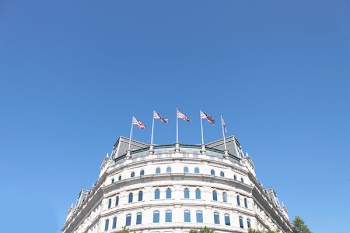 Low Angle Photo of White Concrete Building