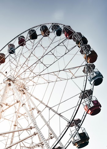 Low Angle Photo of White Ferris Wheel