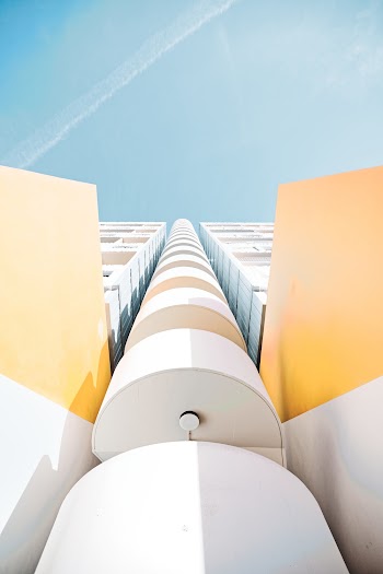 Low Angle Photo of White High-rise Building