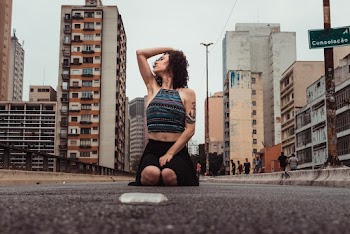 Low-Angle Photo of Woman Posing on Street