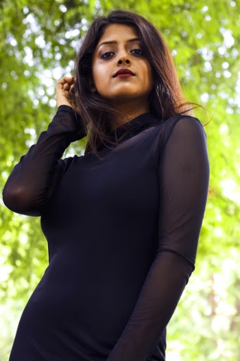 Low Angle Photo of Woman Wearing Black Dress