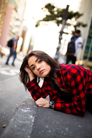 Low-Angle Photo of Woman Wearing Red Plaid Shirt