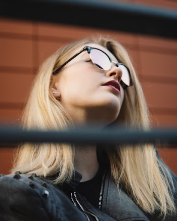 Low Angle Photo of Woman Wearing Sunglasses