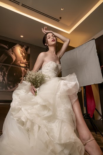 Low Angle Photo of Woman Wearing Wedding Gown