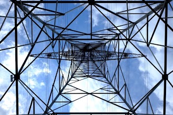 Low Angle Photograph of Black Metal Tower Satellite during Daytime