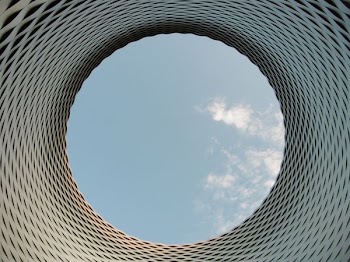 low angle photograph of building with sky roof