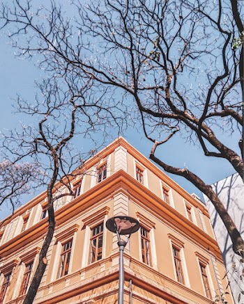 Low Angle Photography Of A Beige Building