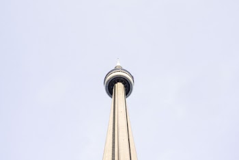 Low-angle Photography of a Tower Under a Calm Blue Sky