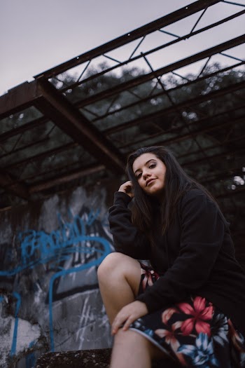 Low-angle Photography of a Woman Wearing Black Sweater