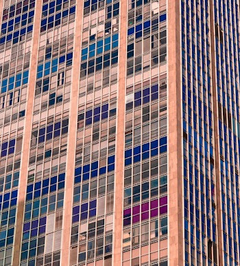 Low-angle Photography of Beige and Blue Building