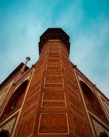 Low Angle Photography Of Brown Building