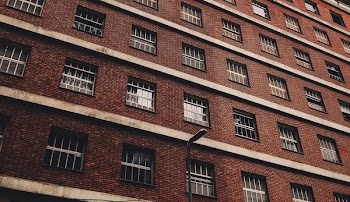low-angle photography of brown concrete building