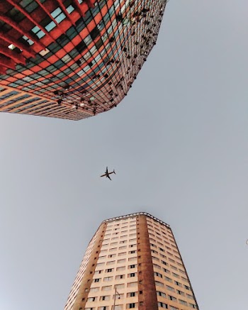 Low angle photography of brown concrete buildings