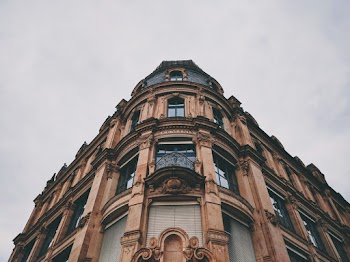 Low Angle Photography of Brown Concrete Structre