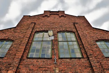 low angle photography of brown painted building