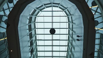 Low Angle Photography of Clear Glass Ceiling
