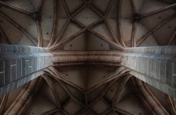 low angle photography of concrete building interior