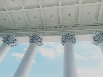Low-angle Photography of Corinthian-style Columns
