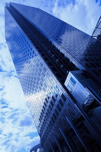 Low Angle Photography of Curtain Wall High Rise Building and during Day Time