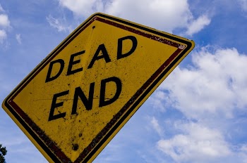 Low-angle Photography of Dead End Road Signage Under Cloudy Sky
