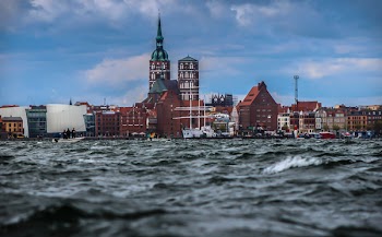 Low Angle Photography of Establishment With Church
