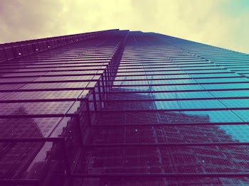 Low Angle Photography of Glass Building