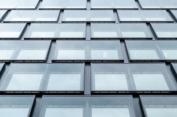 low angle photography of glass building